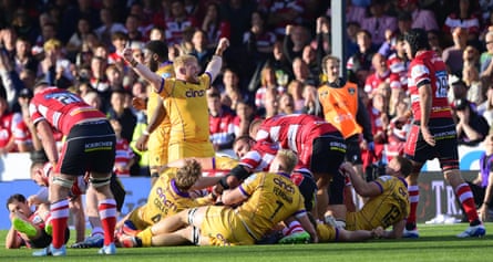 Robbie Smith celebrates at the full-time whistle after Northampton defeat Gloucester.