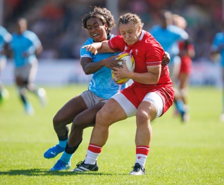 Wales’s Lleucu George holds off a challenge from Fiji’s Setaita Railumu during their 2026 Women’s Rugby World Cup pool match.