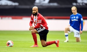 Sheffield United’s David McGoldrick takes a knee in support of Black Lives Matter.