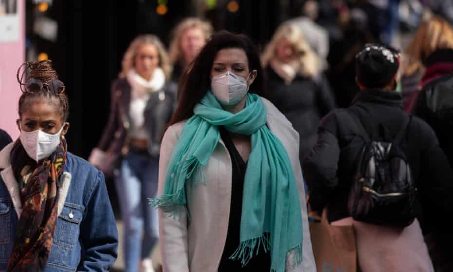 People wearing masks on Oxford Street in London