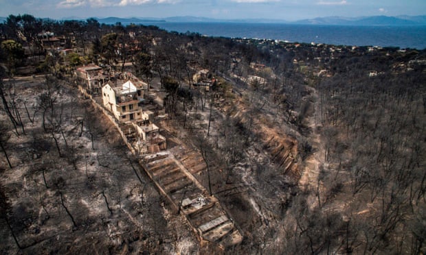 Damage caused by wildfire in the village of Mati, near Athens