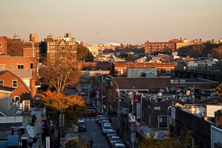 Sunset over Jackson Heights buildings.