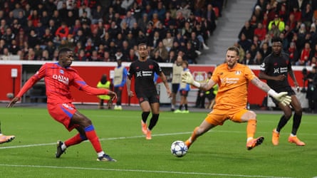 Ousmane Dembélé scores Paris Saint-Germain’s sixth goal at Bayer Leverkusen.