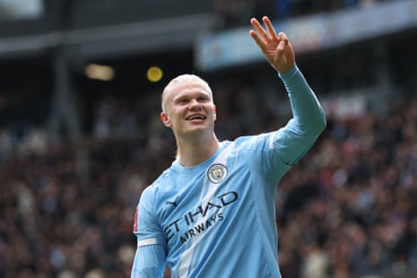 Haaland holds up three fingers