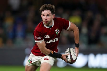 Hugo Keenan runs with the ball for British & Irish Lions