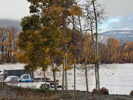 Pickup trucks in flood water