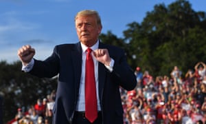 Trump dances during a campaign rally at The Villages Polo Club in Florida.