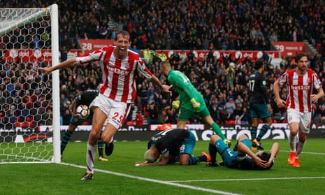 Peter Crouch celebrates after scoring from close range.