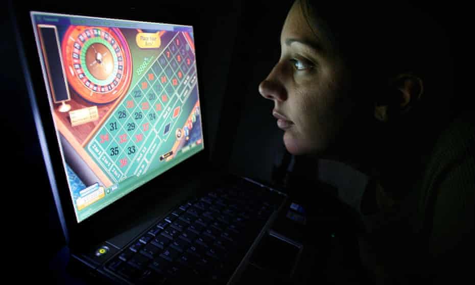 Woman gambling on laptop