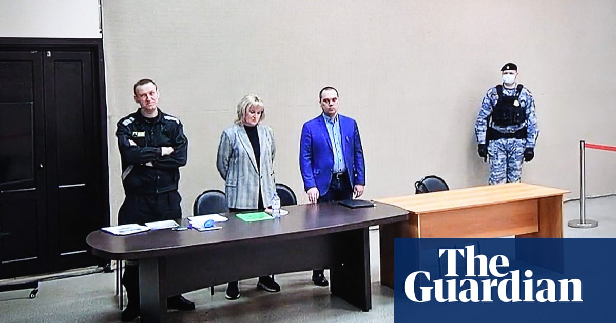Alexei Navalny faces 13 more years in jail after court finds him guilty of fraud