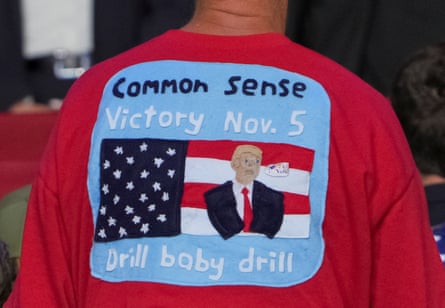 back of red shirt with knitted US flag and man