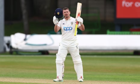 Alex Lees raises his bat