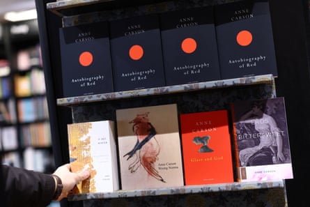 Anne Carson books arranged on a shelf