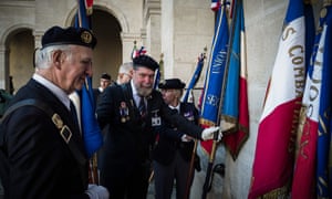 Harki veterans at a ceremony at Les Invalides in Paris to mark the national day of homage to the Harkis
