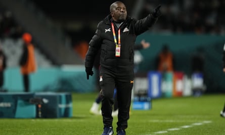 Bruce Mwape, head coach of Zambia, directs his team during their World Cup defeat by Spain
