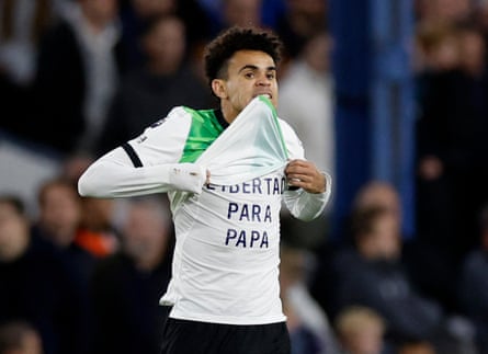 5 November 2023 Liverpool’s Luís Diaz reveals a message to his father, who was abducted by terrorists in his native Colombia, while celebrating a goal against Luton at Kenilworth Road.