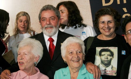 President Luiz Inacio Lula da Silva poses for a photograph with relatives of some of those who died or disappeared during the 1964-85 military dictatorship at the Planalto Palace in Brasília, in 2007.