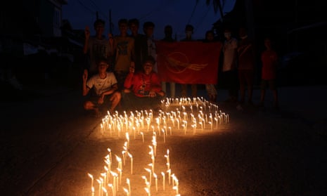 People attend sit-in protest and prayer ceremony for those who have died during protests against Myanmar’s military coup in Kyat Sar Pyin Quarter, Dawei, Myanmar.