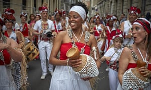 A Brazilian street band plays in the Marais Quarter as Parisians celebrate the first day of summer with Fete de La Musique on Sunday