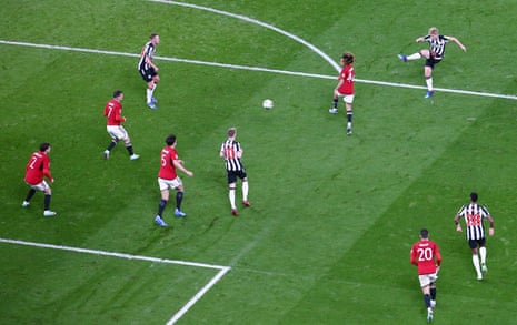 Lewis Hall of Newcastle United scores a goal to make it 2-0 at Manchester United.