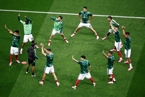 Mexico's players greet fans as they warm up