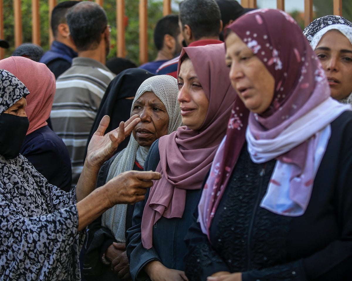 At least 27 Palestinians killed by Israeli fire at food point, Gaza officials say | Gaza | The Guardian At least 27 Palestinians killed by Israeli fire at food point, Gaza officials say | Gaza | The Guardian