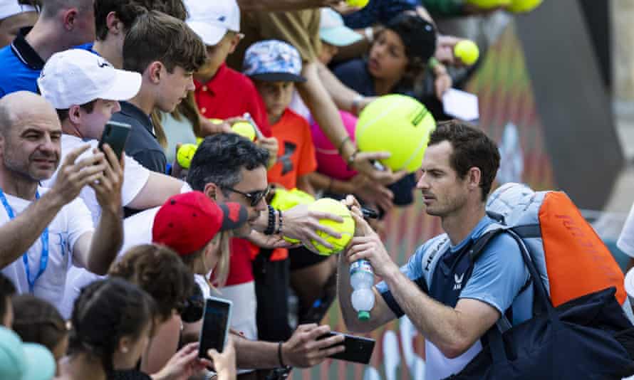 Andy Murray signs autographs after his win against Australia’s Nick Kyrgios