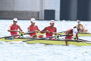 China’s rowers react after competing in the women’s four final during the Tokyo 2020 Olympic Games at the Sea Forest Waterway in Tokyo on July 28, 2021.