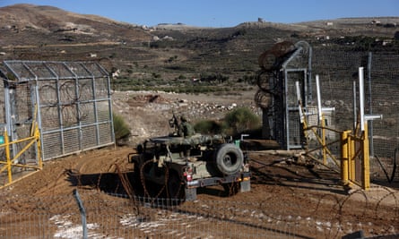 An Israeli military vehicle enters Syria at the ceasefire line by Syria and the Israeli-occupied Golan Heights on 23 December.