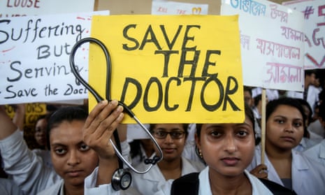 Doctors protest outside a public hospital in Agartala