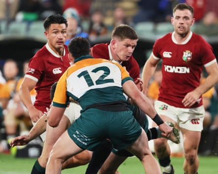 Owen Farrell runs at David Havili