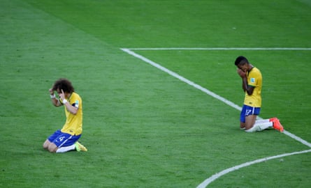 Brazil’s David Luiz (left) and Luiz Gustavo look dejected after their 7-1 semi-final humiliation at the hands of Germany in 2014.