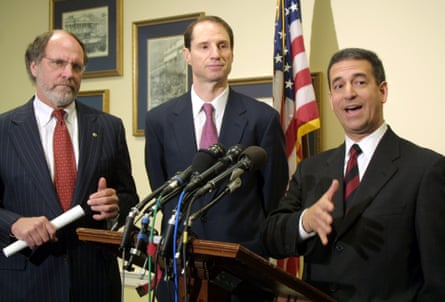 Sen. Russ Feingold, D-Wis., right, accompanied by Sen. Jon Corzine, D-N.J., left, and Sen. Ron Wyden, D-Ore., at a Capitol Hill news conference in 2003 announcing legislation to suspend the Total Information Awareness Program and data-mining.