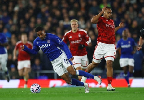 Ipswich's Emersonn falls under a challenge by Nottingham Forest's Murillo