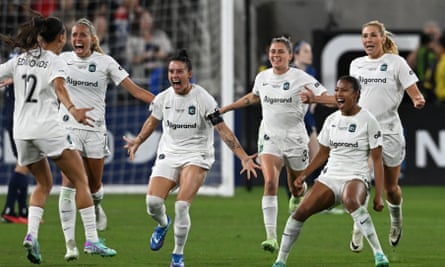 Ali Krieger and his teammates celebrate after winning the NFL Finals.