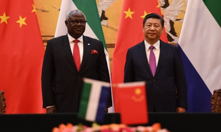 Former Sierra Leone president Ernest Bai Koroma and China’s president, Xi Jinping, preside over a signing ceremony in Beijing in 2016.