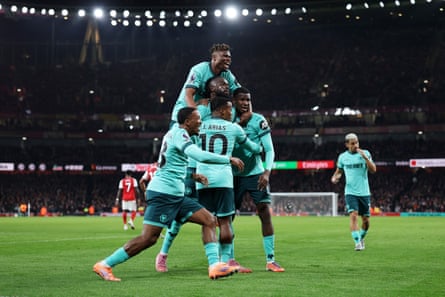 Wolves players celebrate their late equaliser