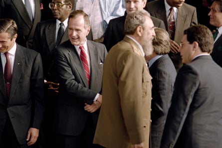 President HW George Bush looks the other way as the Cuban leader Fidel Castro passes in front of him at the Earth summit, 1992