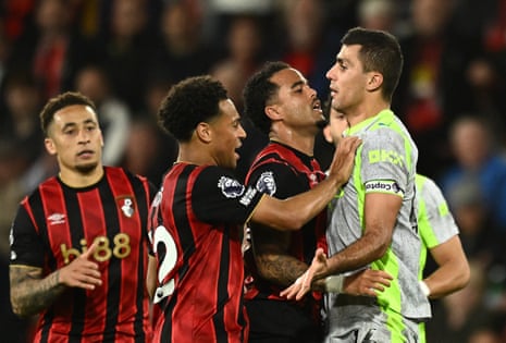 Manchester City's Rodri clashes with Bournemouth’s Justin Kluivert.