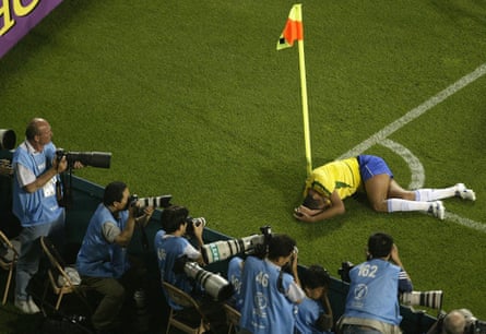 Rivaldo clutches his head after falling to the turf in Ulsan.