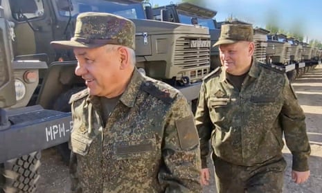 Sergei Shoigu, left, on his inspection in Russia’s southern military district