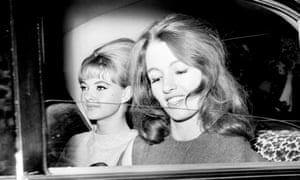 Christine Keeler, (right), and Mandy Rice-Davies leaving the Old Bailey after the first day of the trial of Dr Stephen Ward. 22 July 1963.