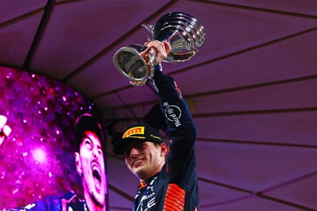 Max Verstappen celebrates on the podium.