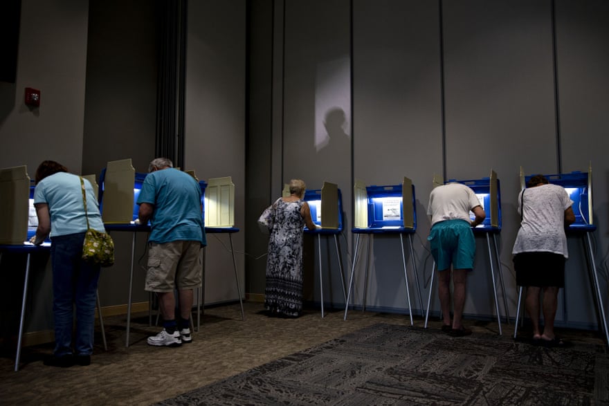 Voters fill out ballots in Janesville, Wisconsin on 14 August 2018.
