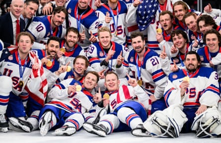 The US celebrate with their gold medals after the win over Canada.