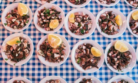 Dishes of octopus at Ballarò Market, one of the most ancient open-air markets in Palermo.