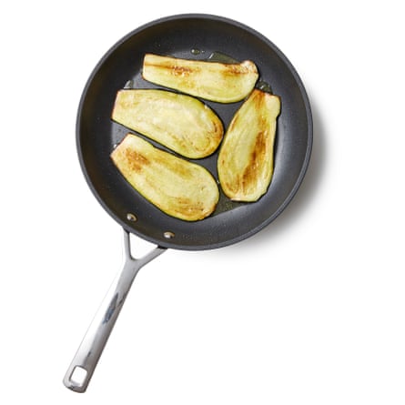 Felicity Cloake’s Vegan Moussaka. Meanwhile, cover the base of a frying pan with olive oil and set it on a medium-high heat. Once hot, pat the aubergines dry and fry them in batches until soft and golden,