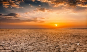 Cracked earth soil sunset landscape