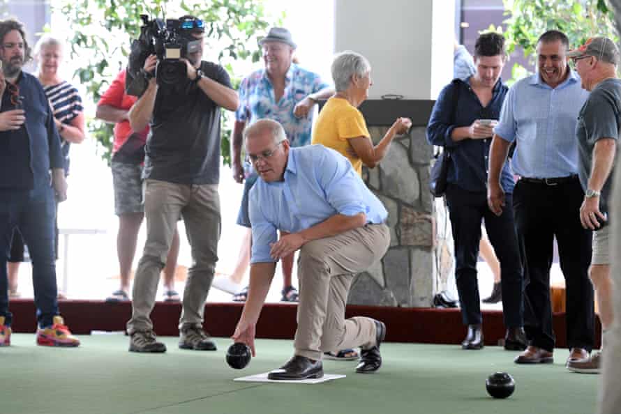 Scott Morrison plays lawn bowls at a retirement village in Caboolture on Thursday.