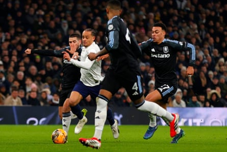 Spurs’ Xavi Simons bursts past Aston Villa’s Emi Buendía and Morgan Rogers in their FA Cup third round tie